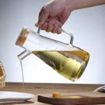 ظرف روغن شیشه بروسیلیکات درب بامبو 900 میلی طرح لیزا کد albirx-7482